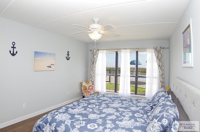 bedroom with ceiling fan, access to outside, and dark hardwood / wood-style flooring