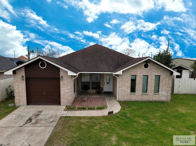 single story home featuring a garage and a front lawn