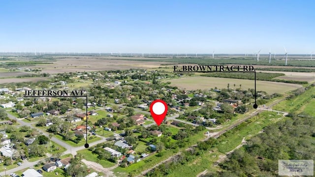 birds eye view of property featuring a rural view