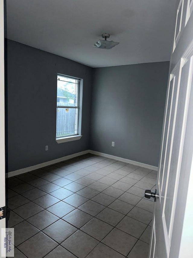 view of tiled spare room