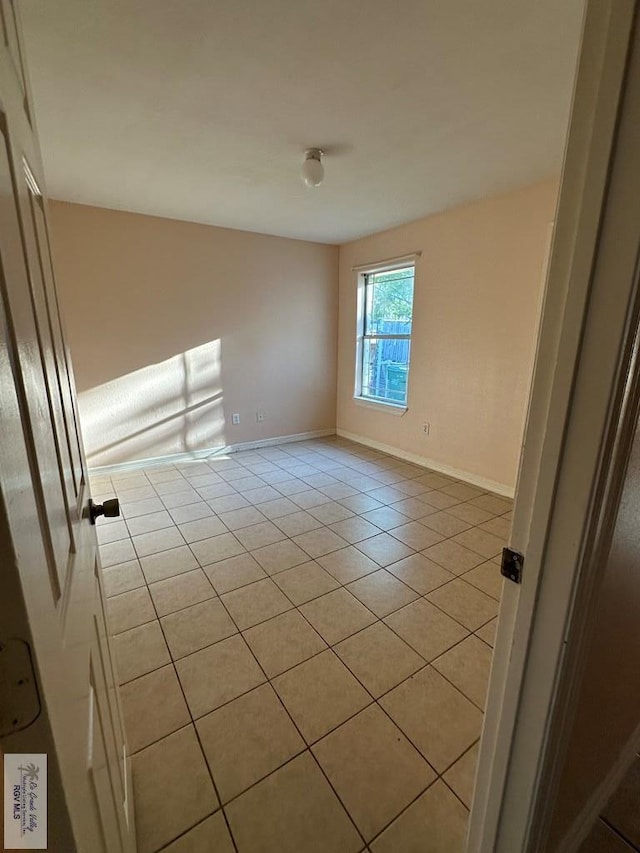 view of tiled spare room