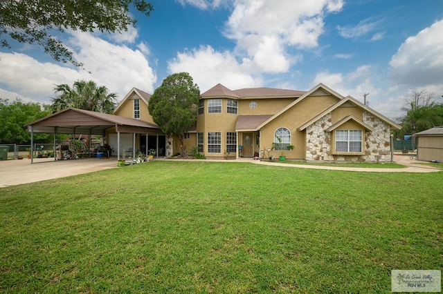 view of front facade featuring a front lawn, a carport, stone siding, and stucco siding