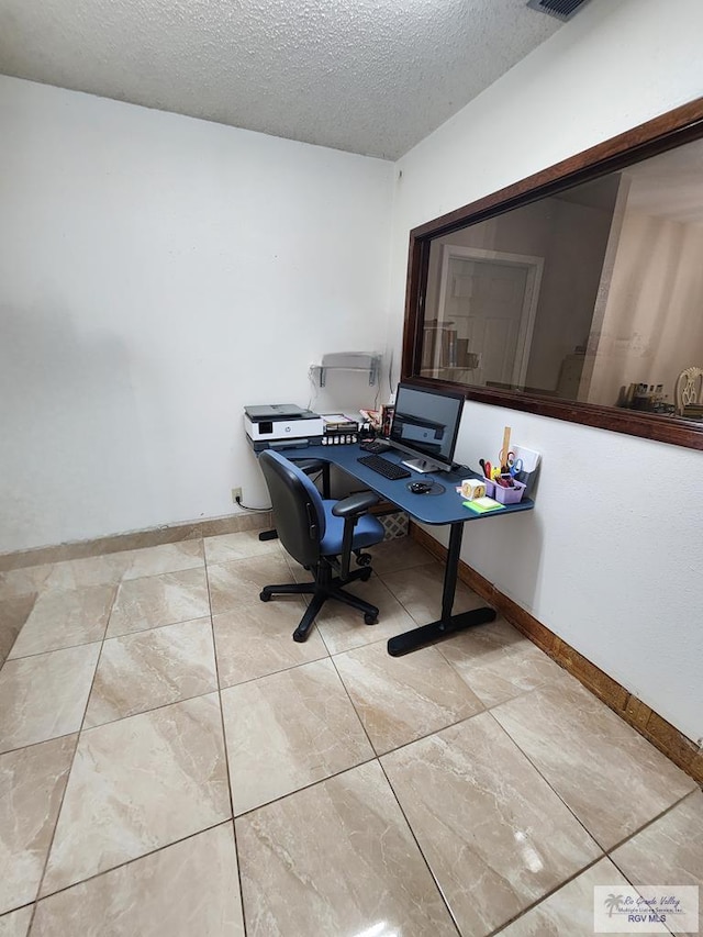 480 Madrid Ct, San Benito, TX 78586 - office space featuring a textured ceiling and baseboards