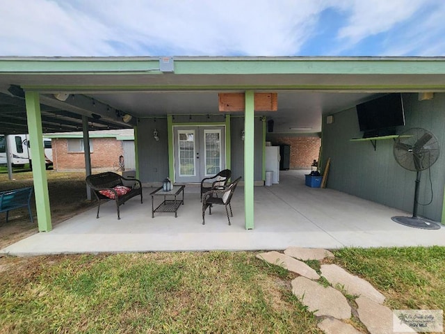 480 Madrid Ct, San Benito, TX 78586 - view of patio / terrace featuring french doors