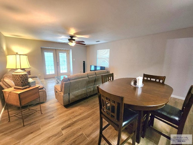 480 Madrid Ct, San Benito, TX 78586 - dining area featuring a ceiling fan and light wood-style floors