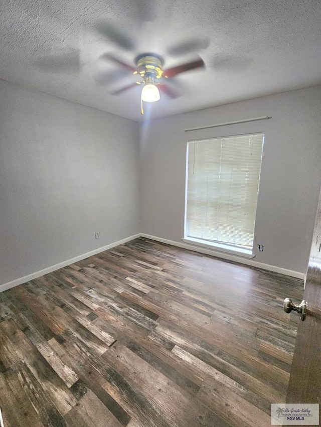 480 Madrid Ct, San Benito, TX 78586 - spare room featuring wood finished floors, a ceiling fan, a textured ceiling, and baseboards