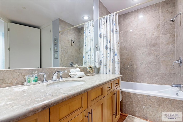 310A Padre Blvd Unit 803, South Padre Island, TX 78597 - bathroom with vanity and tiled shower / bath combo