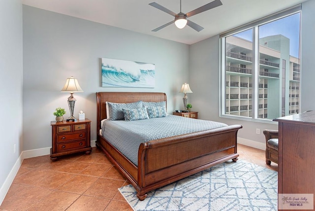 310A Padre Blvd Unit 803, South Padre Island, TX 78597 - bedroom featuring tile patterned flooring and a ceiling fan