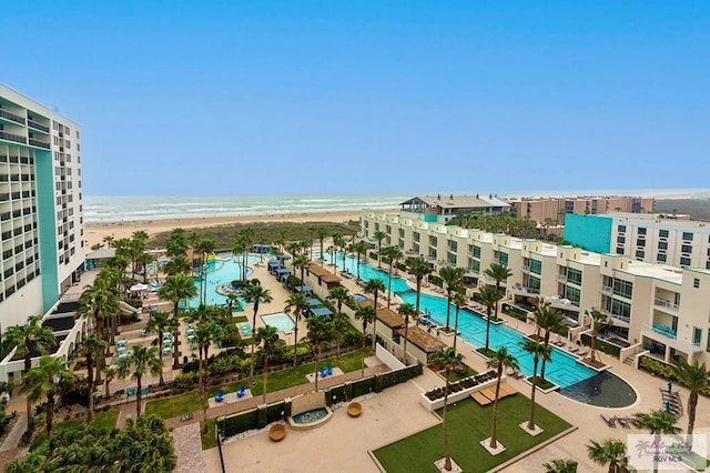 310A Padre Blvd Unit 803, South Padre Island, TX 78597 - drone / aerial view of a pool area and extended coastline