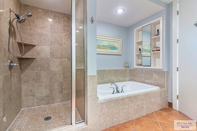 310A Padre Blvd Unit 803, South Padre Island, TX 78597 - full bath with a stall shower, a garden tub, and tile patterned flooring