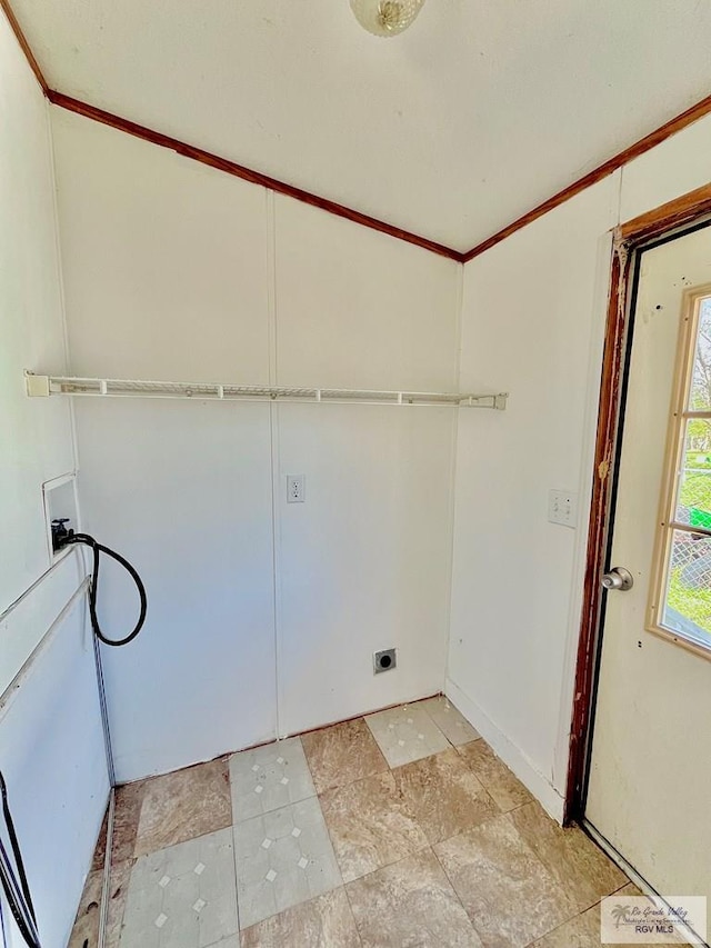 clothes washing area with hookup for a washing machine, laundry area, and electric dryer hookup