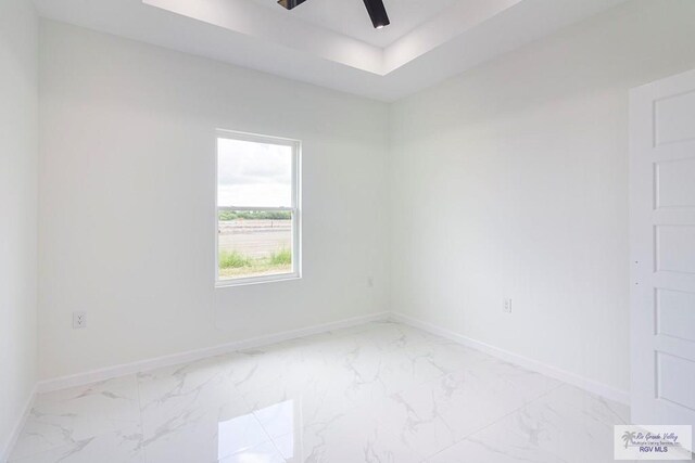 spare room featuring ceiling fan