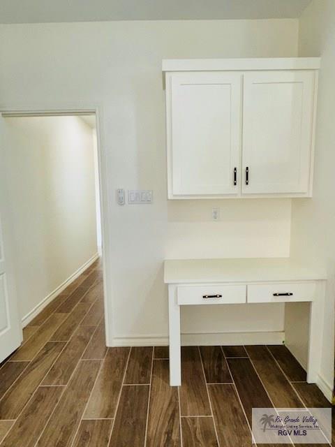 16602 Napper Ln, Primera, TX 78552 - detailed view of wood finished floors and baseboards