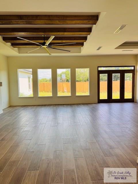 16602 Napper Ln, Primera, TX 78552 - unfurnished room with healthy amount of natural light, ceiling fan, and wood finished floors