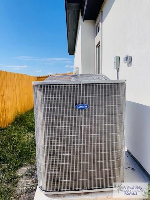 16602 Napper Ln, Primera, TX 78552 - exterior view of central AC unit and stucco siding