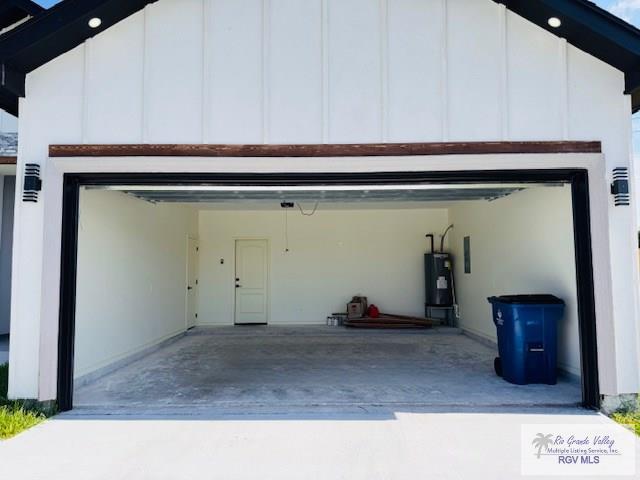16602 Napper Ln, Primera, TX 78552 - garage with water heater and concrete driveway