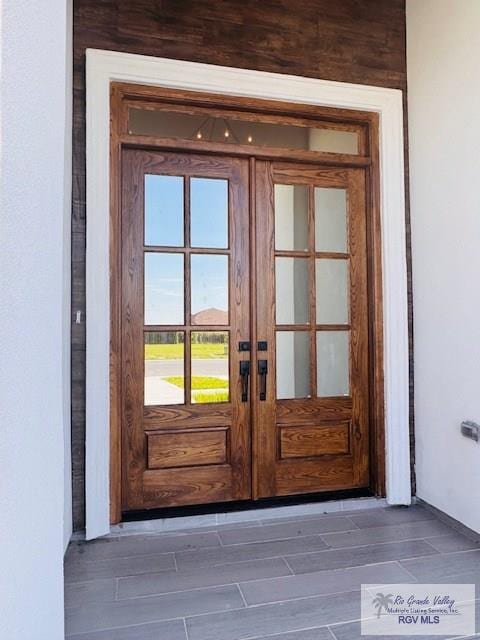 16602 Napper Ln, Primera, TX 78552 - doorway to property featuring french doors and stucco siding