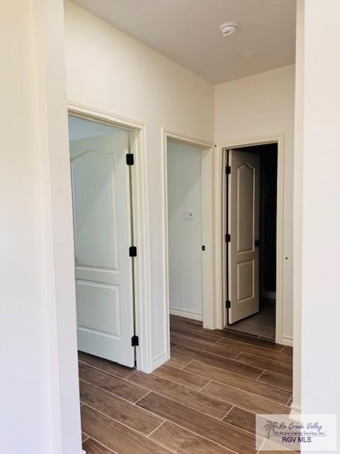 16602 Napper Ln, Primera, TX 78552 - hallway featuring wood finished floors and baseboards