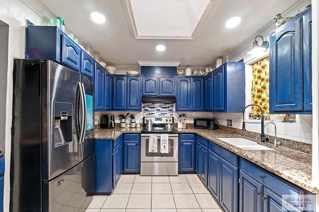 kitchen with blue cabinetry, sink, stainless steel appliances, dark stone counters, and ornamental molding