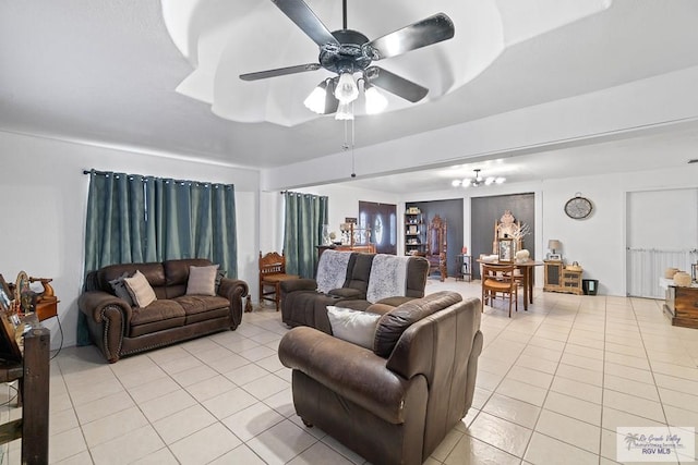 tiled living room with ceiling fan