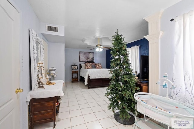 bedroom featuring ceiling fan and light tile patterned floors