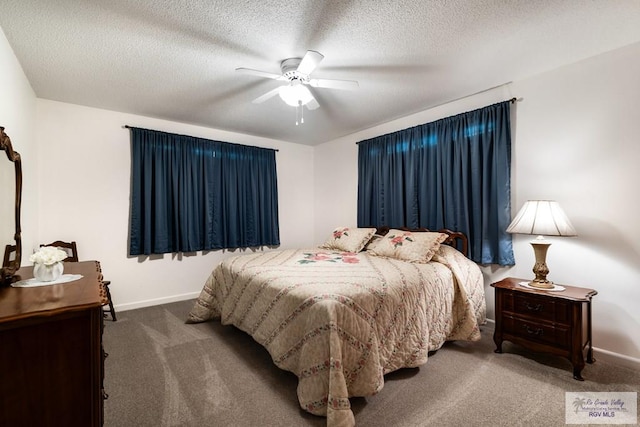 7969 Fm 2099, Lyford, TX 78580 - bedroom with carpet floors, ceiling fan, and a textured ceiling