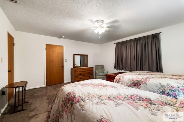 7969 Fm 2099, Lyford, TX 78580 - bedroom with carpet floors, a textured ceiling, and a ceiling fan
