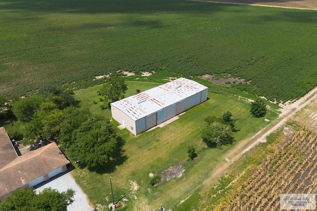 birds eye view of property with a rural view