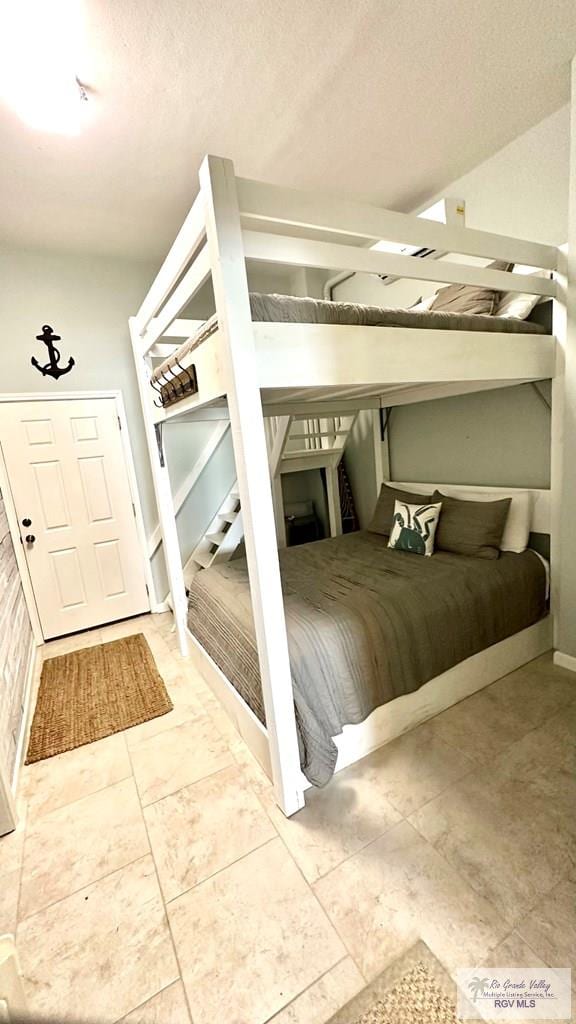 bedroom featuring a textured ceiling