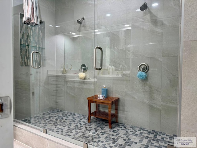 139 Heron Dr, Los Fresnos, TX 78566 - bathroom featuring a shower stall