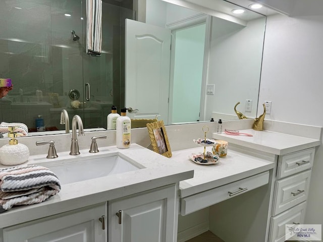 139 Heron Dr, Los Fresnos, TX 78566 - bathroom featuring vanity and a shower stall