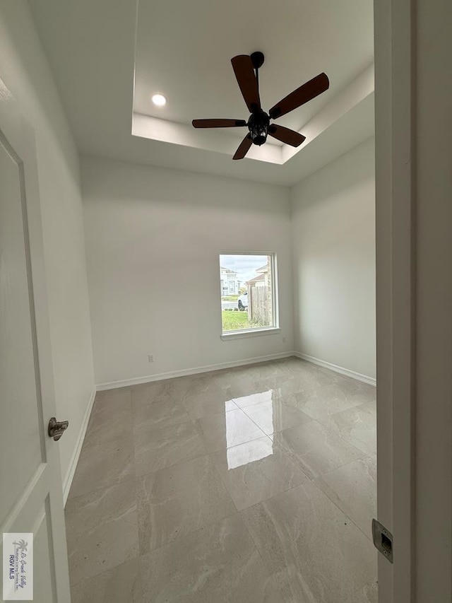 139 Heron Dr, Los Fresnos, TX 78566 - spare room featuring a raised ceiling, recessed lighting, and ceiling fan