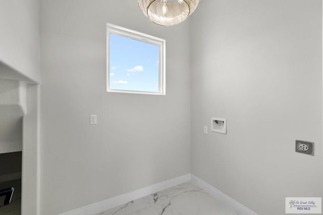 1013 Butler St, Edinburg, TX 78541 - laundry area with electric dryer hookup, baseboards, washer hookup, and light marble finish flooring