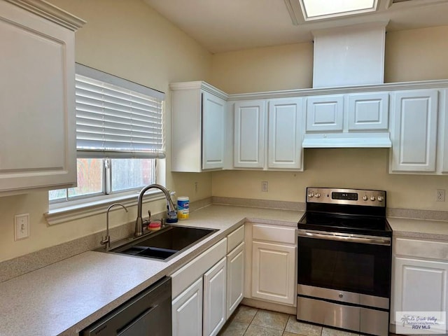 2100 Emory Ave Unit 291, Mcallen, TX 78504 - kitchen featuring stainless steel range with electric cooktop, a sink, dishwashing machine, under cabinet range hood, and white cabinets
