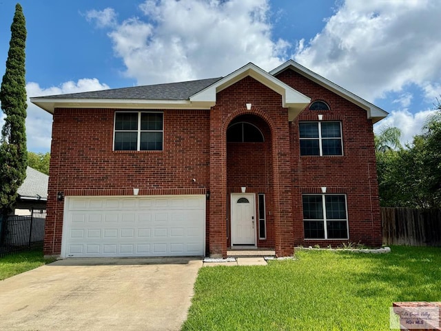 2100 Emory Ave Unit 291, Mcallen, TX 78504 - traditional-style house featuring concrete driveway, brick siding, and a garage