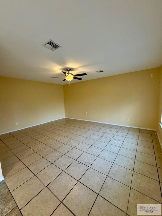 2100 Emory Ave Unit 291, Mcallen, TX 78504 - empty room with a ceiling fan, light tile patterned flooring, and baseboards