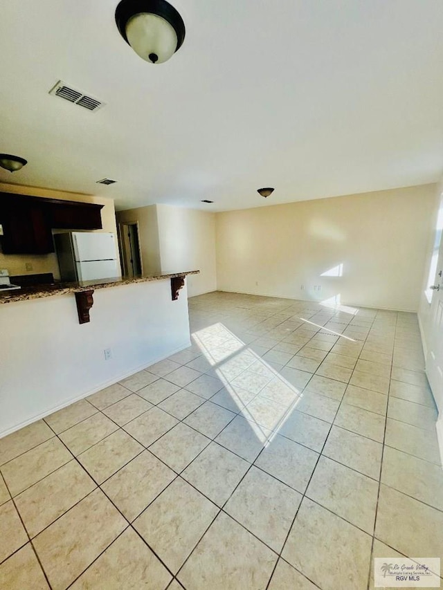 interior space featuring light tile patterned flooring