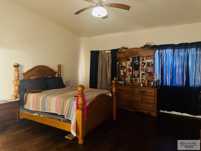 bedroom featuring wood finished floors and ceiling fan