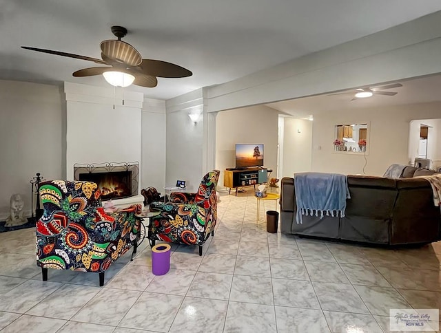 living room featuring ceiling fan