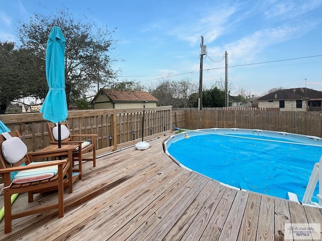 view of pool with a deck