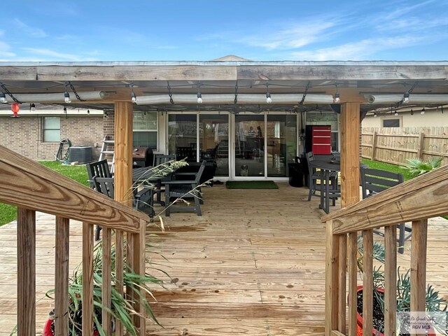 wooden deck featuring central AC