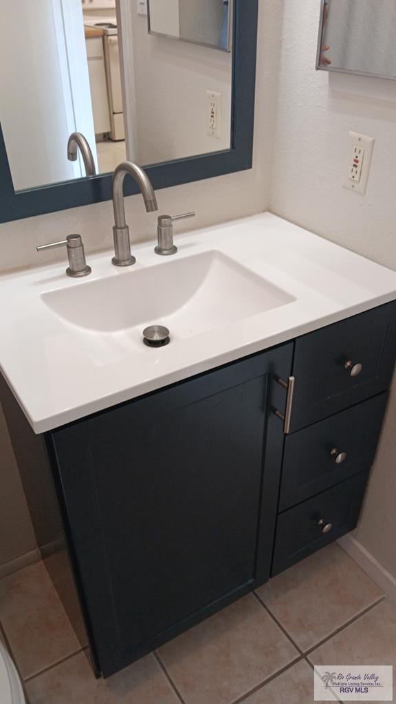 2 Palmetto Ct, Brownsville, TX 78521 - bathroom with vanity and tile patterned floors