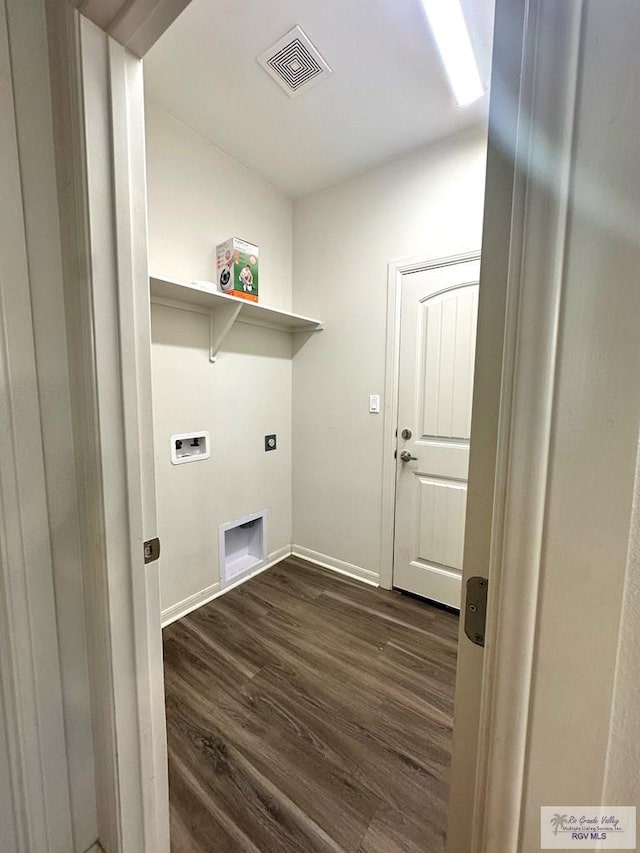 laundry room with dark wood-type flooring and washer hookup