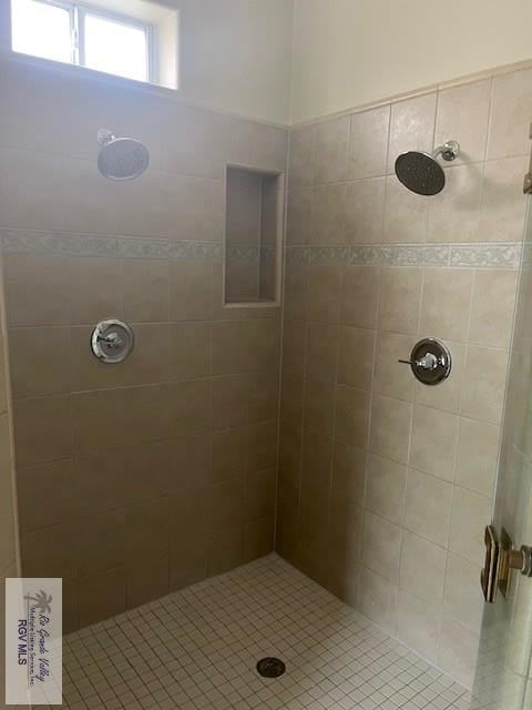 71 Cortez Ave, Rancho Viejo, TX 78575 - full bathroom featuring tiled shower