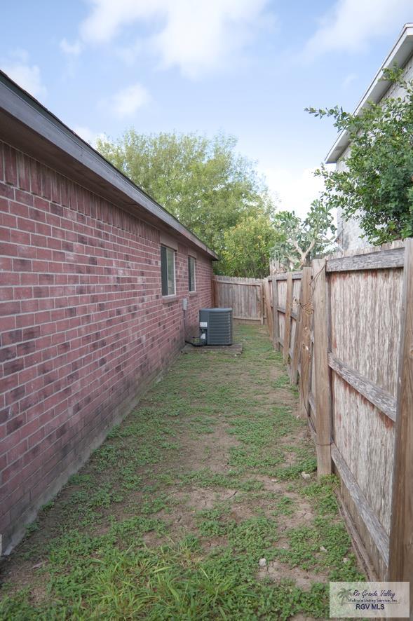 view of yard featuring cooling unit