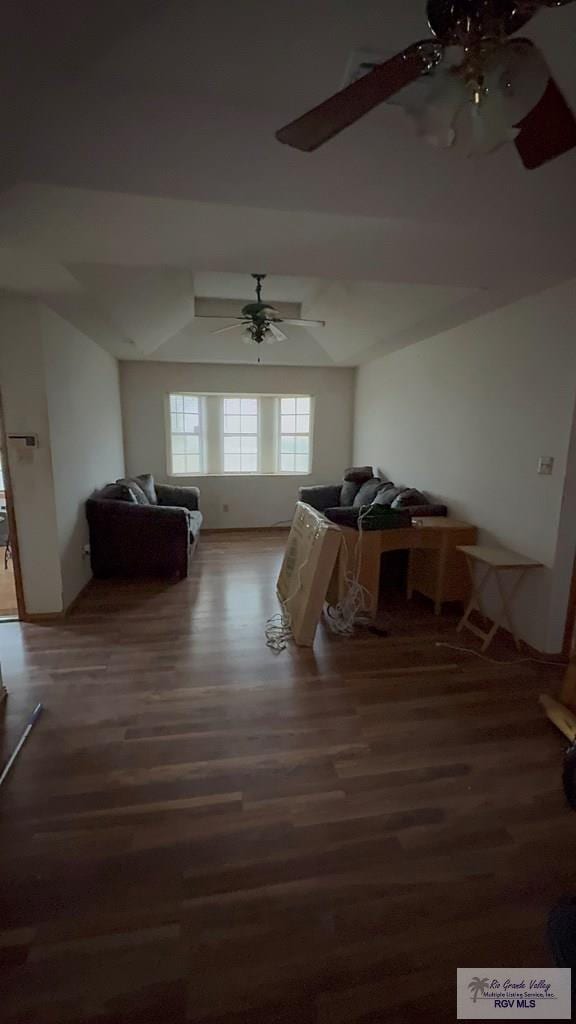 bonus room with dark wood-type flooring and ceiling fan