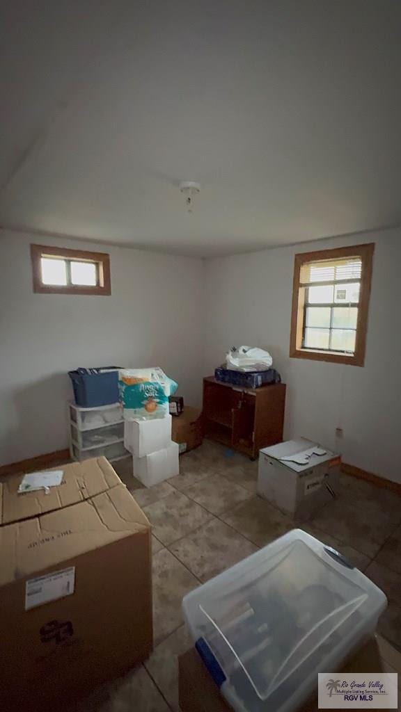 interior space with light tile patterned flooring