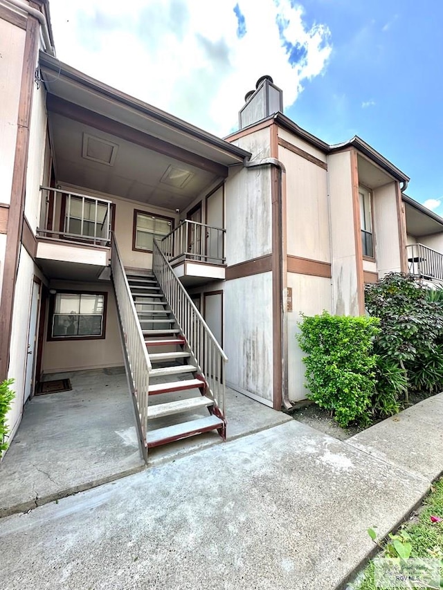 exterior space featuring stairs