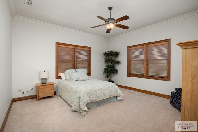 bedroom featuring light carpet, ceiling fan, and crown molding