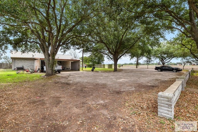 view of yard featuring a carport